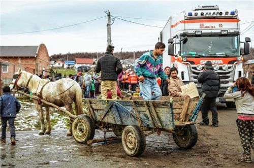 Die Ladeflächen sind leer, die Herzen sind erfüllt: Die Weihnachtstrucker sind glücklich wieder daheim