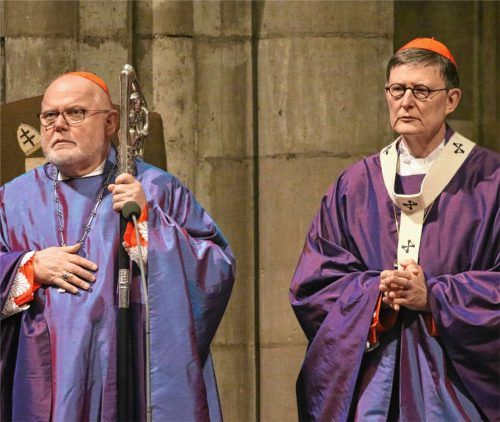 Unterschiedliche Ansichten, ob man konfessionsverschiedene Ehepartner in Einzelfällen zur Kommunion zulassen soll: Der Vorsitzende der Deutschen Bischofskonferenz, Kardinal Reinhard Marx (links), und der Kölner Erzbischof Kardinal Rainer Maria Woelki. Foto dpa