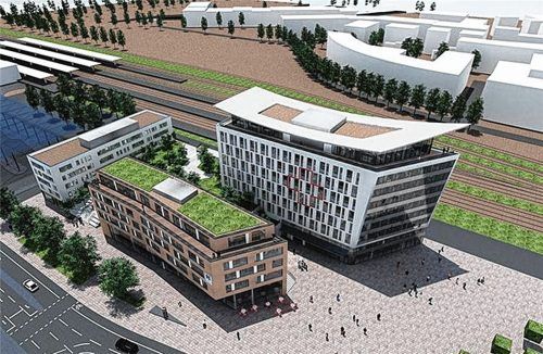 Futuristisch mutet das Ärztezentrum mit dem Flugdach an. Davor soll das Dienstleistungszentrum entstehen. Zur Orientierung: links im Bild das B-&-B-Hotel. Die ersten Container für die Bauarbeiter (kleines Foto) sind am Donnerstag aufgestellt worden. Architekturbüro AEP