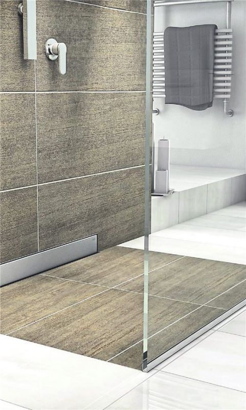 Duschen, die auf einer Ebene in den Boden übergehen, lassen kleine Bäder optisch größer wirken. Foto dpa/Mepa