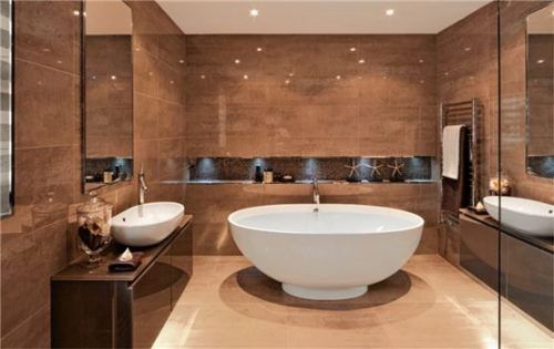 Designbeläge werden im Bad immer beliebter – sei es auf dem Boden oder an der Wand.Foto GEV / Mapei