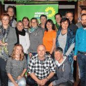 Menschen mit einem grünem Herzen