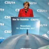 Merkel zu Gast beim Kini