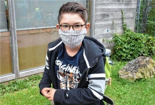 Findet den Mund-Nasen-Schutz „nicht wirklich klasse“: Drittklässler Pauli Adlmaier aus Rosenheim.