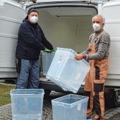 Die ehrenamtlichen Herren des Müll-Mobils
