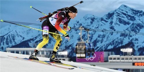 Evi Sachenbacher-Stehle als Biathletin bei den Olympischen Spielen 2014.Foto DPA/Schmidt