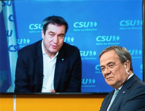 Zwei Kandidaten, ein Ziel: Armin Laschet, Ministerpräsident von Nordrhein-Westfalen und Landesvorsitzender der dortigen CDU, steht in einem Studio in Köln, während CSU-Chef Markus Söder zugeschaltet ist.Foto dpa