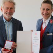 Malteser Dankplakette für Paul Breitner