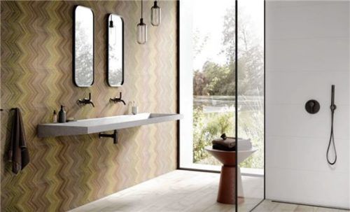 Komfortbad mit bodenebener, schwellenlos zugänglicher Dusche – und extravagantem Fliesendesign im XL-Format. Foto djd/Deutsche-Fliese.de/Steuler