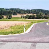 Straße zum Wertstoffhof asphaltiert