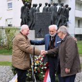 Drei Überlebende zurück in Dachau