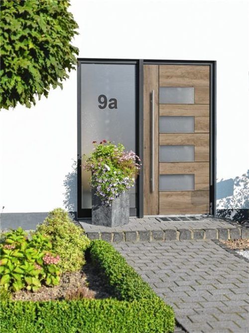 Interessante Akzente bei dieser Haustür im Altholz-Look.
Foto Rodenberg Türsysteme AG