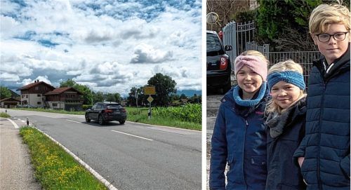 Emily (Mitte) mit ihrer Freundin Isabella und ihrem Bruder Jakob stehen wartend an der viel befahrenen Aiblinger Straße in Kolbermoor. Fotos Bettinger/Lagler