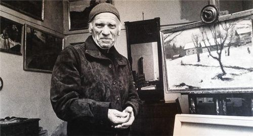 Rudolf Groeschel in seinem Atelier in Fentbach (circa 1980). Auf der Staffelei ein Ölbild des umgebauten Zehentstadels. giesen