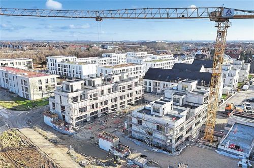 Neubauwohnungen (wie hier in einem Neubaugebiet in Kirchheim bei München) dürften im Preis wieder steigen. Foto IMAGO/Sven Simon