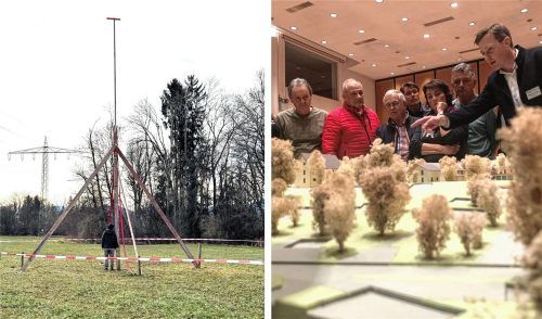 Mit einer Gerüst-Aktion (links) reagieren Kritiker auf die am Modell gezeigten Pläne zum Wohnbauprojekt „Am Alpenblick“ in Kolbermoor. Foto re/Bettinger