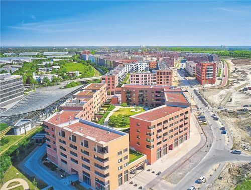 In Immobilien – hier ein Neubaugebiet in Hannover – wird wieder stärker investiert. Foto IMAGO/Future Image