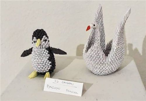 Lanny Singer: Origami Pinguin und Schwan.