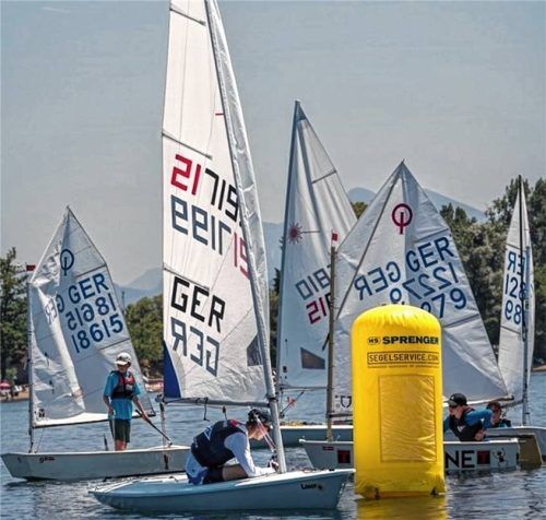 Optimistboote und Ilca 6 bei den Wettfahrten auf dem Chiemsee.Foto Gerhard Niessen