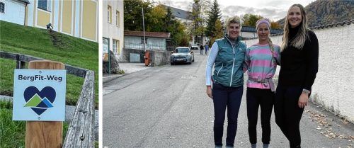 Das Schild weist den Weg entlang des „BergFit-Wegs“. Christine Hammer (Geschäftsführerin Kuratorium für Alpine Sicherheit), Ex-Skilangläuferin Stefanie Böhler und Entwicklerin Dr. Laura Eisenberger testen die Strecke. Foto Nägele