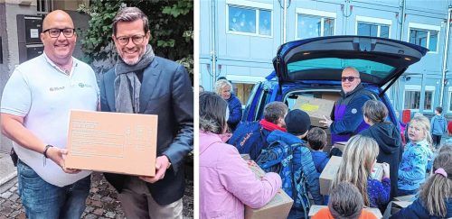 Für die Aktion „Kinder helfen Kindern“ (rechts im Bild aus einem früheren Jahr) hat in diesem Jahr der ehemalige Verteidigungsminister Karl-Theodor zu Guttenberg (linkes Bild, rechts) auch ein Paket gespendet und es dem Aiblinger Organisator Alexander Wolff überreicht. Foto re/Hecht