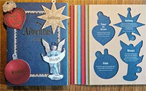 Der „Adventus“-Kalender mit den ersten vier herausgelösten Stanz-Figürchen, daneben die restlichen Kartons.Foto gärtner