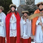 Sternsinger ziehen von Haus zu Haus