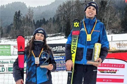 Zwei strahlende Gesichter: Lorenz Stöckl (rechts) mit Gold, Christina Reheis mit Silber um den Hals.Foto re