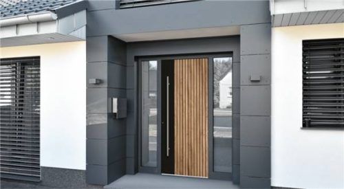 Seitliche Lichtausschnitte verbreitern das Entree. Dunkle Grautöne sind derzeit besonders gefragt.Foto Rodenberg Türsysteme AG