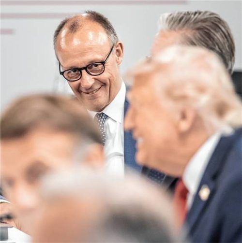 Bundeskanzler Friedrich Merz (CDU) mit US-Präsident Donald Trump beim G7-Gipfel in Evian teil. Foto dpa
