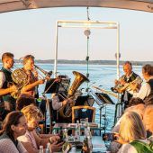Passagiere werden zum Chor