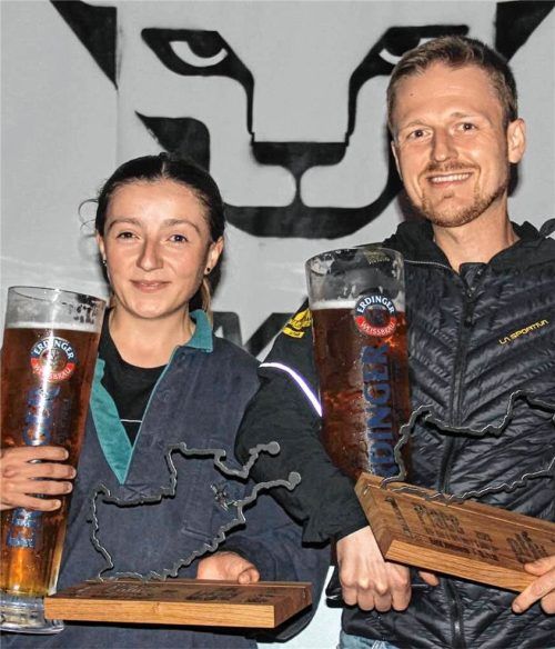 So sehen Sieger mit eisernem Willen aus. Melanie Lenz und David Niegemann bewältigten im Tag- und Nacht-Trailrunning-Lauf 104 Kilometer und über 5.000 Höhenmeter in Rekordzeit. Roland Schmidt